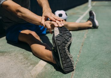 What should a solid football warm-up look like?